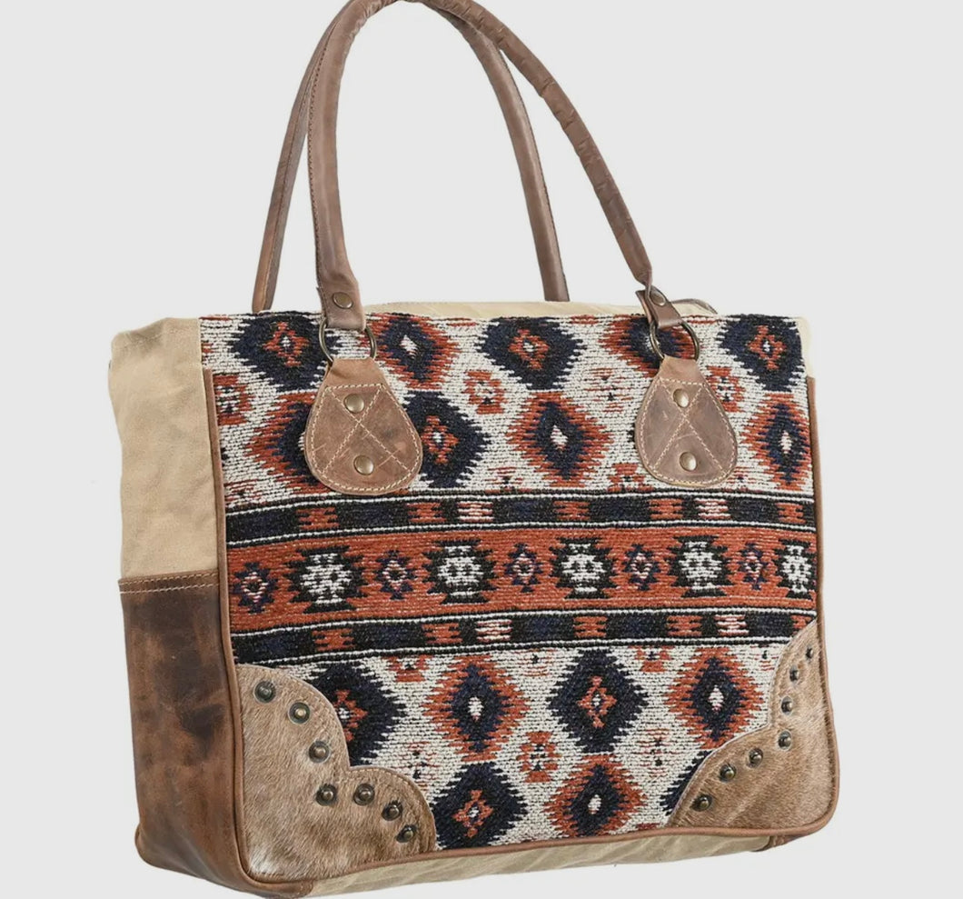 Cowhide hair and leather canvas bag
